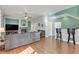 Bright living room features hardwood floors and a fireplace at 633 Finch Island Ave, Henderson, NV 89015