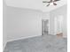 Bright bedroom with ceiling fan and grey tile floor at 6637 Lookout Lodge Ln # 2, North Las Vegas, NV 89084