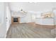 Living room features a fireplace and laminate wood floors at 6637 Lookout Lodge Ln # 2, North Las Vegas, NV 89084