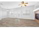 Bright living room with sliding glass doors and wood-look floors at 6637 Lookout Lodge Ln # 2, North Las Vegas, NV 89084