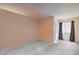 Spacious bedroom with light walls and new flooring at 6861 Tamarus St # 203, Las Vegas, NV 89119