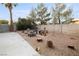 Spacious backyard with fire pit and seating area at 7336 Young Doe Ave, Las Vegas, NV 89130