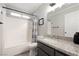 Clean bathroom, granite countertop, and shower/tub combo at 7336 Young Doe Ave, Las Vegas, NV 89130