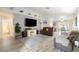 Living room featuring hardwood floors and a view into the dining area at 7336 Young Doe Ave, Las Vegas, NV 89130