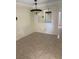 Dining area with tile floors and a chandelier at 7509 W Gilmore Ave, Las Vegas, NV 89129