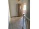 Bright entryway with tile flooring, interior door and staircase at 7509 W Gilmore Ave, Las Vegas, NV 89129