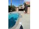 Large backyard pool with patio and covered area at 7509 W Gilmore Ave, Las Vegas, NV 89129