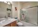 Clean bathroom with a shower/tub combo and updated vanity at 7824 Homing Pigeon St, North Las Vegas, NV 89084