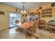 A second view of the dining room, showcasing the access to the backyard at 7824 Homing Pigeon St, North Las Vegas, NV 89084