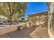 Covered patio with a view of the neighborhood and a potted plant at 7824 Homing Pigeon St, North Las Vegas, NV 89084