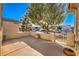 Spacious patio with a gate and views of the neighborhood at 7824 Homing Pigeon St, North Las Vegas, NV 89084