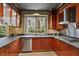 Stylish kitchen featuring stainless steel appliances, custom cabinets, and tiled flooring at 8199 Pinnacle Peak Ave, Las Vegas, NV 89113