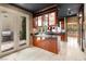 Modern kitchen with stainless steel appliances, granite countertops, and an outside view at 8199 Pinnacle Peak Ave, Las Vegas, NV 89113