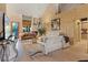 Elegant living room with high ceilings and a cozy fireplace at 8199 Pinnacle Peak Ave, Las Vegas, NV 89113