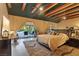 Main bedroom with sliding glass doors opening to the patio at 8199 Pinnacle Peak Ave, Las Vegas, NV 89113