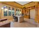 Home office with built-in wooden bookshelves and granite desk at 8199 Pinnacle Peak Ave, Las Vegas, NV 89113