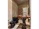 Powder room featuring a unique wooden countertop and mirrored wall creating an interesting visual effect at 8199 Pinnacle Peak Ave, Las Vegas, NV 89113