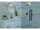 Modern bathroom with marble shower and white vanity at 836 San Eduardo Ave, Henderson, NV 89002