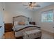 Main bedroom with wood floors and ceiling fan at 836 San Eduardo Ave, Henderson, NV 89002