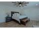 Main bedroom with king-size bed and wood flooring at 836 San Eduardo Ave, Henderson, NV 89002