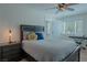 Main bedroom with ceiling fan and en-suite bathroom at 836 San Eduardo Ave, Henderson, NV 89002