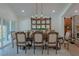 Elegant dining room with large table and chandelier at 836 San Eduardo Ave, Henderson, NV 89002