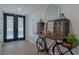 Bright entryway with decorative console table and black doors at 836 San Eduardo Ave, Henderson, NV 89002