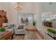 Open concept living room, looking toward kitchen and entry at 836 San Eduardo Ave, Henderson, NV 89002