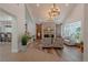 Spacious living room with stone fireplace and barn doors at 836 San Eduardo Ave, Henderson, NV 89002