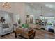 Open living room with views into the kitchen and dining area at 836 San Eduardo Ave, Henderson, NV 89002