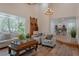 Bright living room with hardwood floors and farmhouse accents at 836 San Eduardo Ave, Henderson, NV 89002