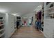 Spacious walk-in closet with ample shelving and hanging space at 836 San Eduardo Ave, Henderson, NV 89002