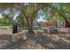 Landscaped yard with stone table and bench at 836 San Eduardo Ave, Henderson, NV 89002