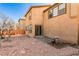 Backyard patio with gravel and bird bath at 8672 Big Sagebrush Ave, Las Vegas, NV 89117