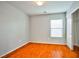 Bright bedroom featuring wood flooring and a large closet at 8672 Big Sagebrush Ave, Las Vegas, NV 89117