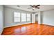 Bright bedroom with wood floors and three windows at 8672 Big Sagebrush Ave, Las Vegas, NV 89117