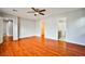 Bright bedroom featuring wood floors and ample closet space at 8672 Big Sagebrush Ave, Las Vegas, NV 89117