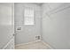 Bright laundry room with ample shelving at 8672 Big Sagebrush Ave, Las Vegas, NV 89117