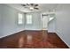 Living room showcasing hardwood floors and neutral walls at 8672 Big Sagebrush Ave, Las Vegas, NV 89117