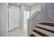 Staircase leading upstairs with wood steps and tile flooring at 8672 Big Sagebrush Ave, Las Vegas, NV 89117