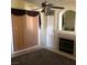 Living room with fireplace and sliding doors at 9016 Gabro Ln, Las Vegas, NV 89123