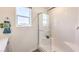 Bathroom with shower and window at 9986 Ullom Dr # 14, Las Vegas, NV 89141