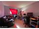 Cozy bedroom with a comfortable couch and a workspace at 1152 Miller Ave, Las Vegas, NV 89106