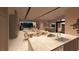Modern kitchen with island and Gathering room access at 129 Still Shores St, Henderson, NV 89011