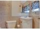 Bathroom featuring tile floor and sink with white vanity at 132 Continental Ave, Henderson, NV 89015