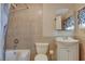 The bathroom features tile flooring and shower-tub combination at 132 Continental Ave, Henderson, NV 89015