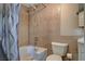 The bathroom features tile flooring and shower-tub combination at 132 Continental Ave, Henderson, NV 89015