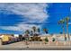 Charming single-story home with desert landscaping, solar panels, and palm trees at 132 Continental Ave, Henderson, NV 89015