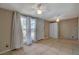Living room featuring tile flooring, white door and cabinets, and lots of natural light at 132 Continental Ave, Henderson, NV 89015