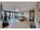 Bright living room with comfy sectional sofa and mountain views at 1456 Via Merano St, Henderson, NV 89052